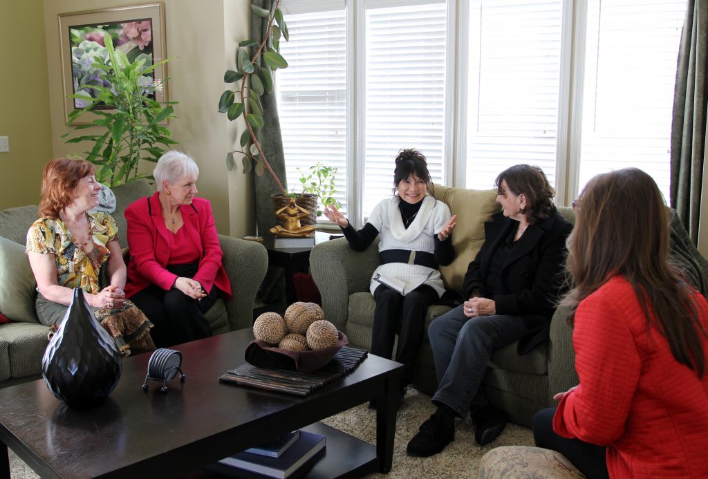 A group of women meeting in a living room